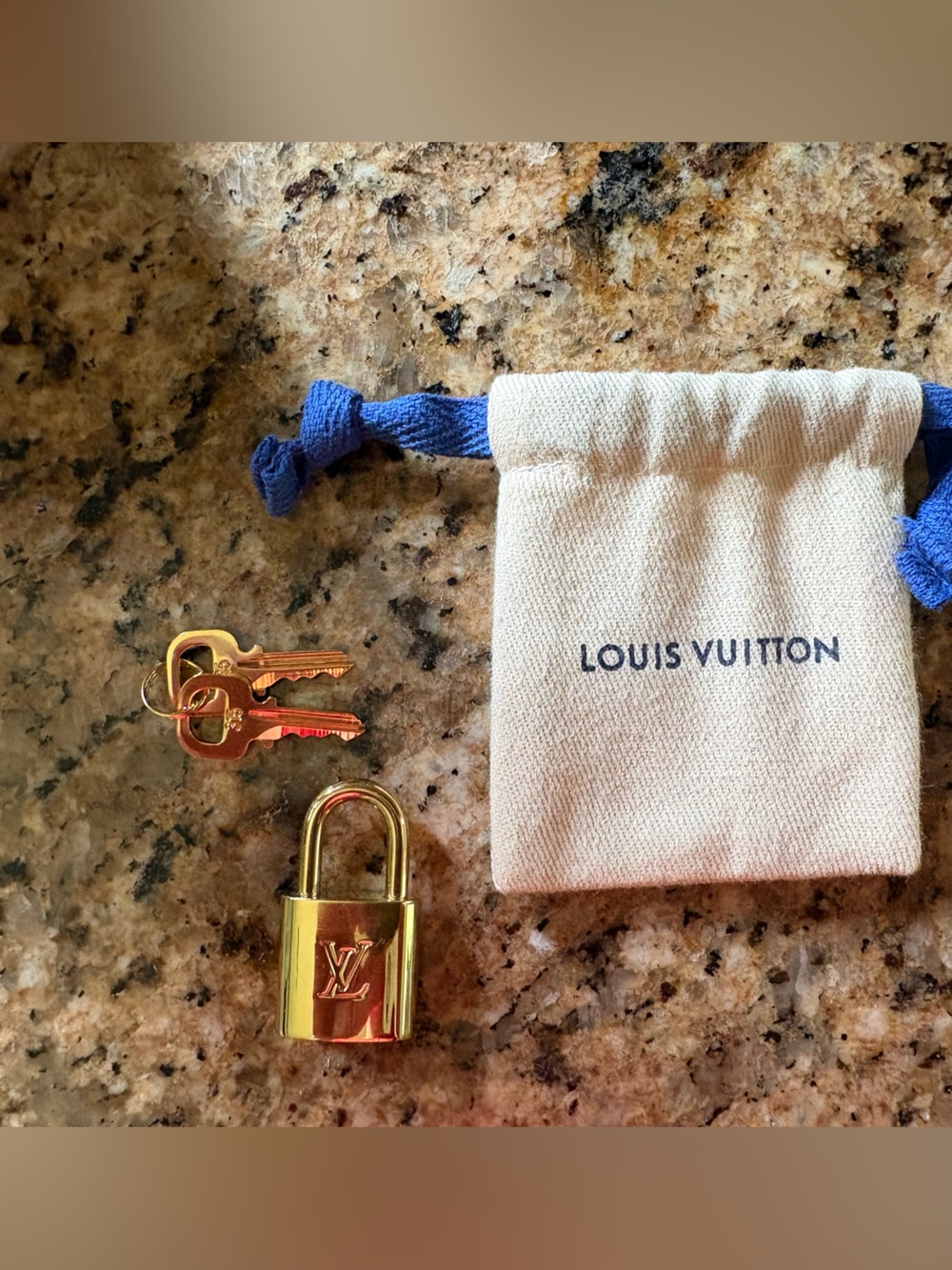 Louis Vuitton lock and key